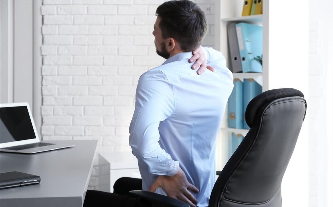 rugpijn bij het zitten